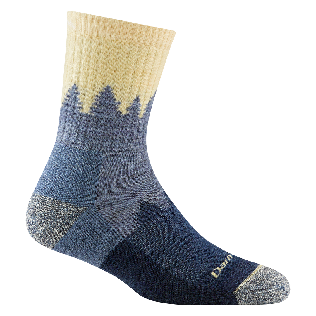 Reverse side of women's treeline micro crew hiking sock in color light denim with yellow calf and blue tree design