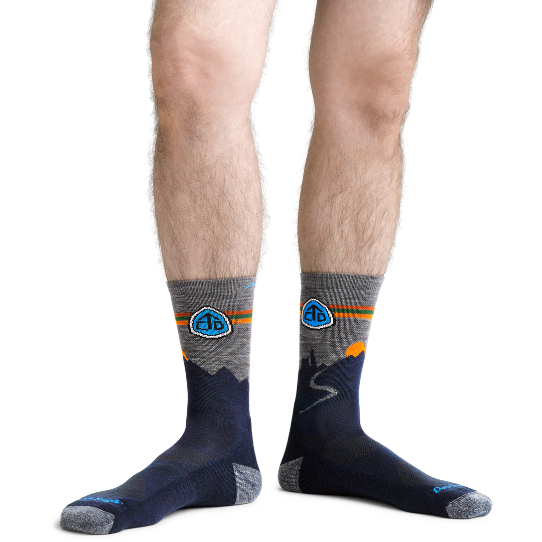 CDT Hiking Socks in Eclipse on foot showing logo