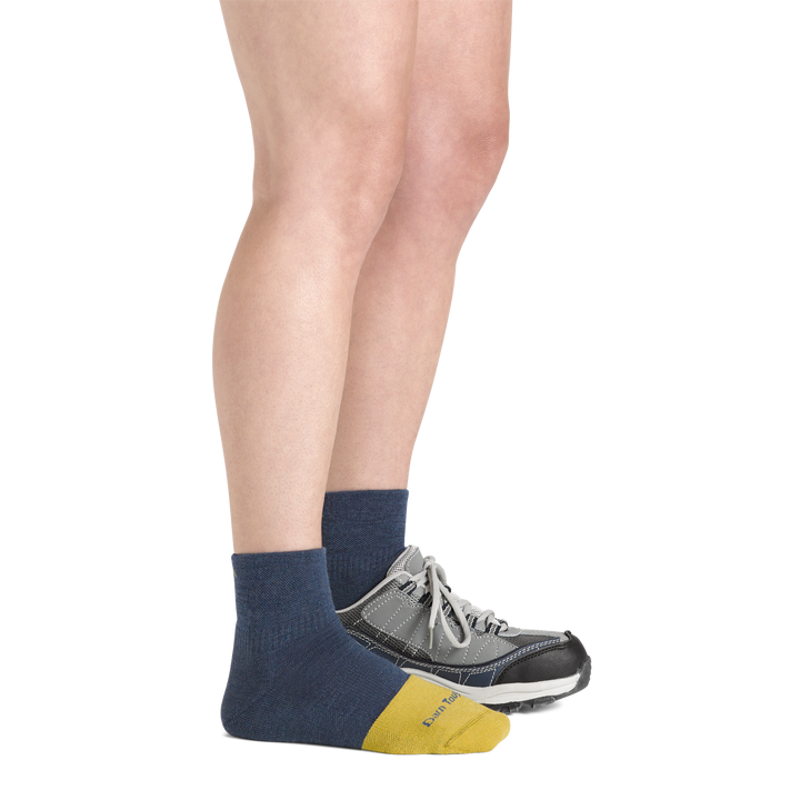 Women's Quarter Work Socks in indigo on foot with sneakers