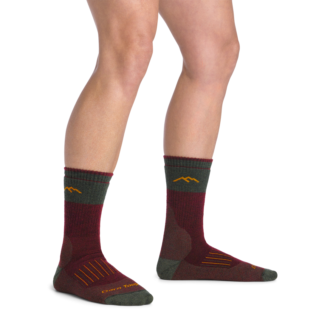 on model image bare foot wearing the 2104 hunting boot sock in ember colorway