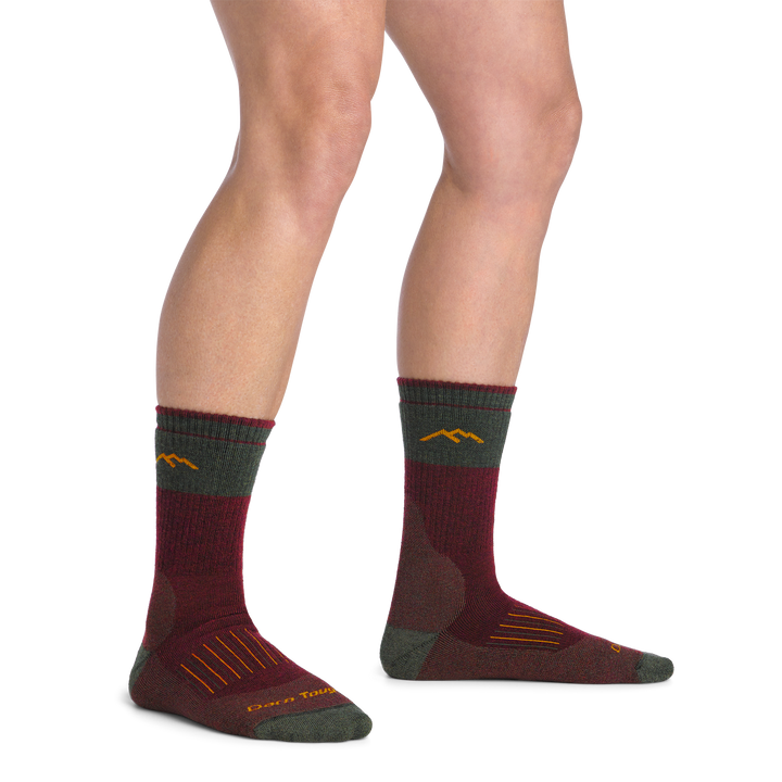 on model image bare foot wearing the 2104 hunting boot sock in ember colorway
