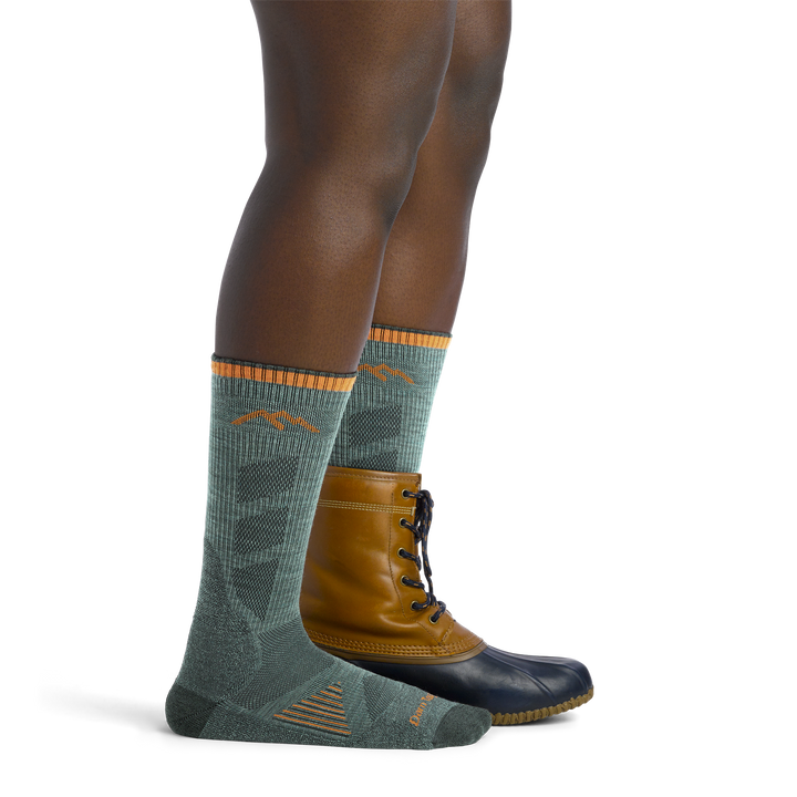 Women's Lightweight Hunting Boots Socks in Seafoam Green on foot with hunting boots