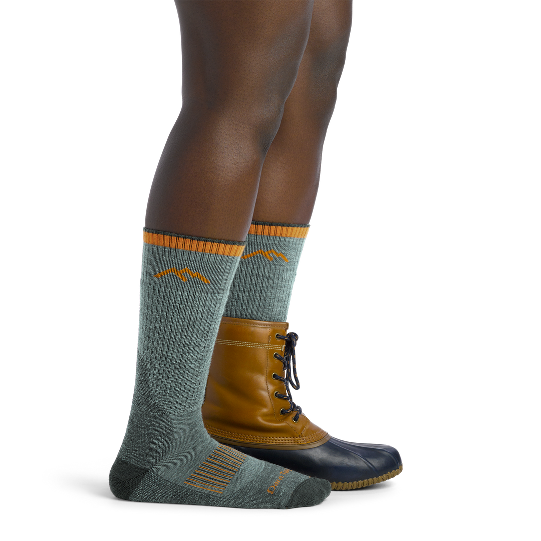 Women's Midweight Hunting Boots Socks in Seafoam Green on foot with hunting boots