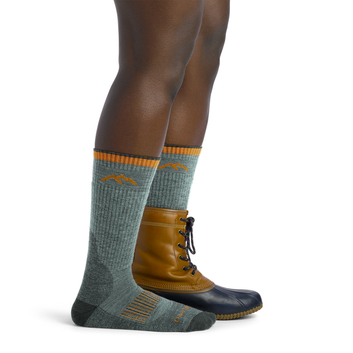 Women's Midweight Hunting Boots Socks in Seafoam Green on foot with hunting boots