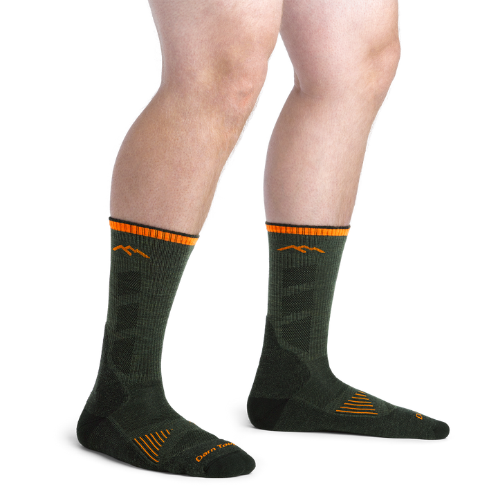 Men's Lightweight Hunting Boots Socks in Forest Green on foot with orange accents