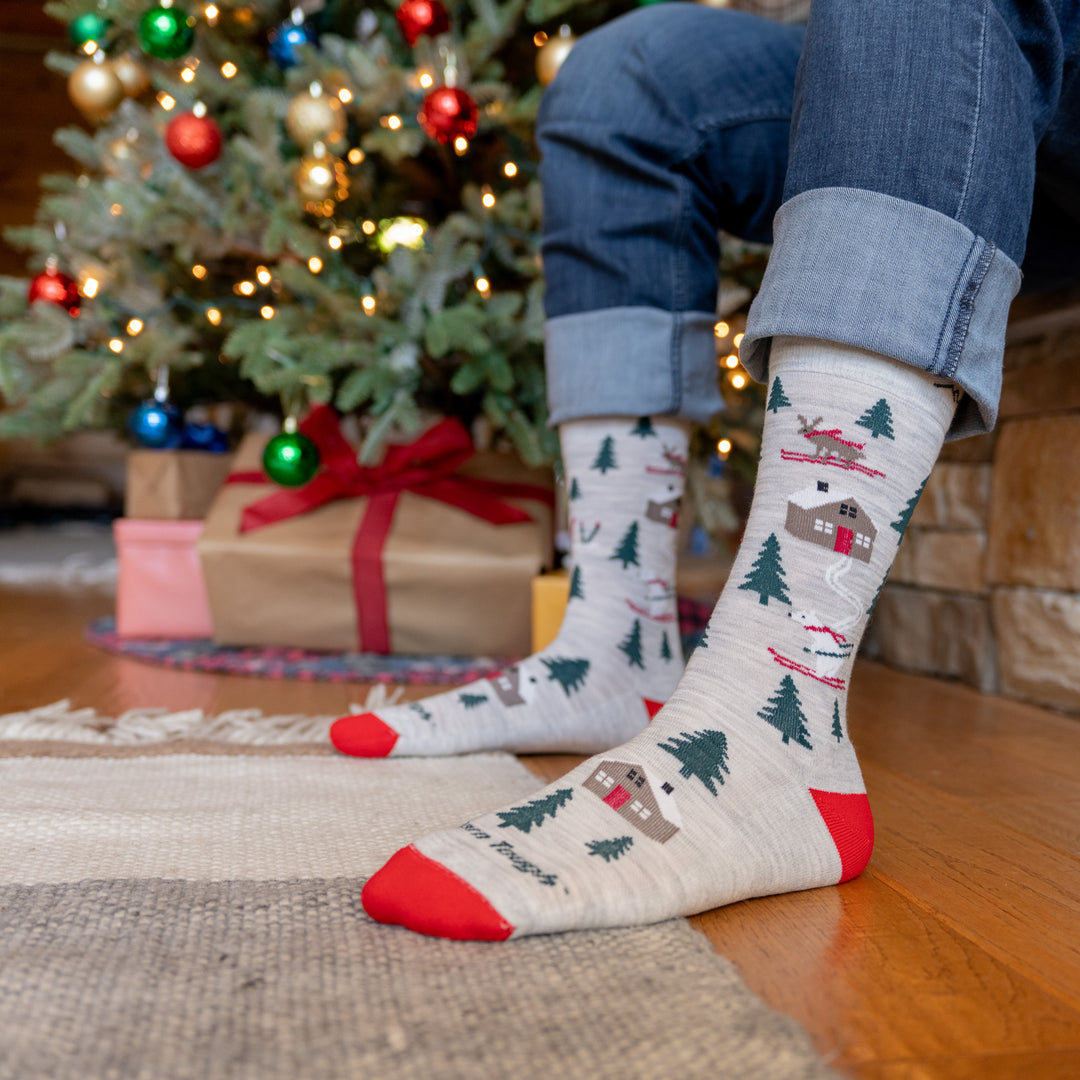 models legs in front of Christmas tree wearing the unisex bunny slope crew 