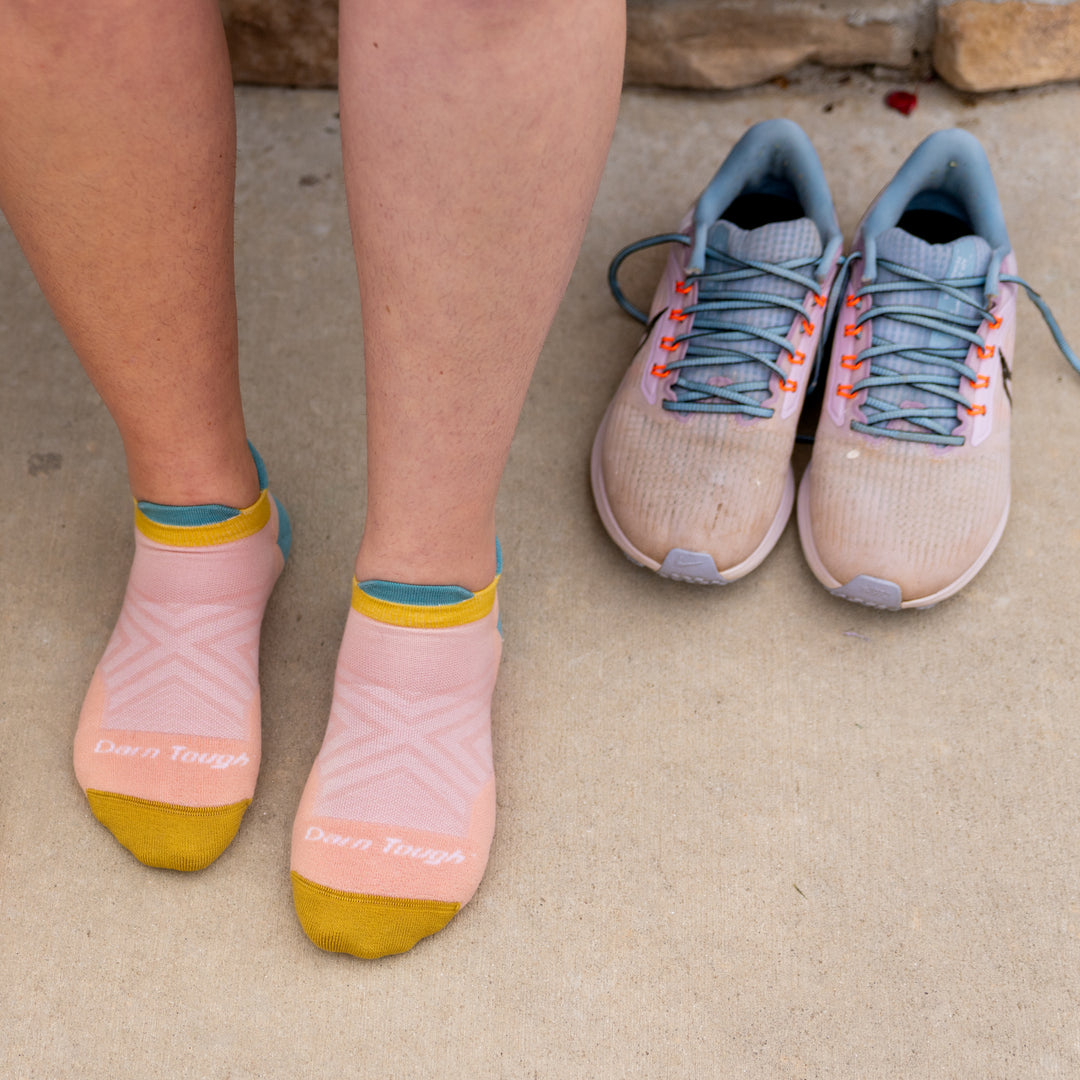 on model image of feet on pavement wearing 1047 Limited edition no show in dusty rose.