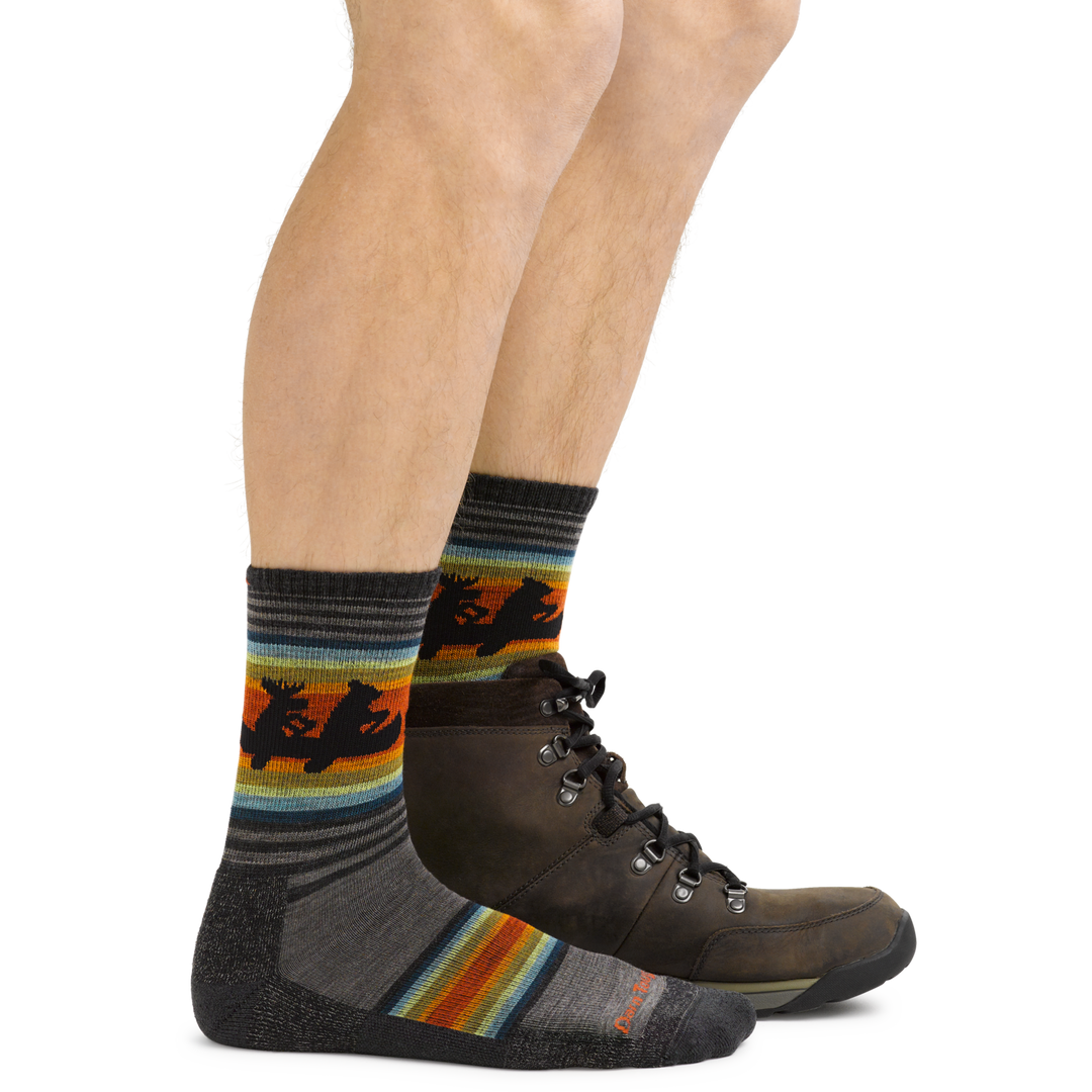 5003 men's Willoughby hiking socks with a canoeing bear and moose design in taupe brown on foot with hiking boots