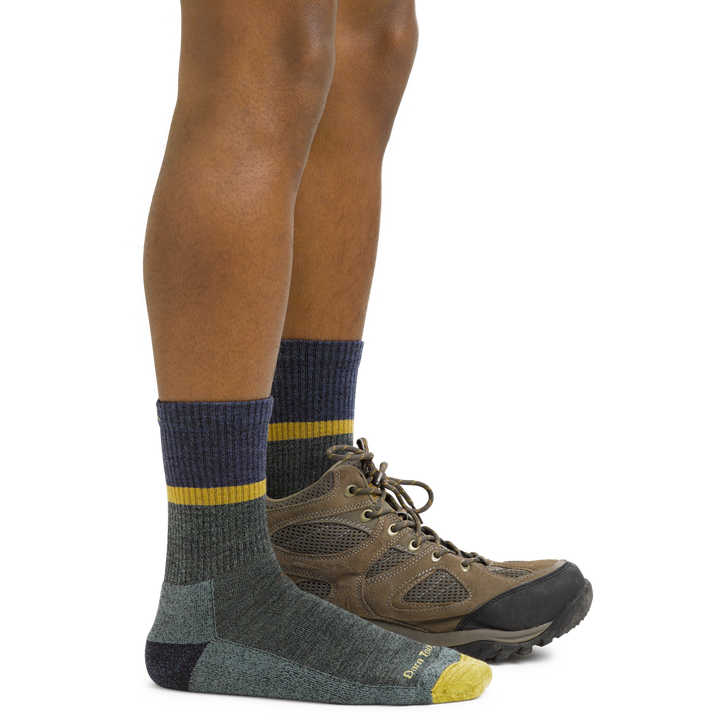 5004 men's ranger merino wool hiking socks in Moss on foot with hiking boot