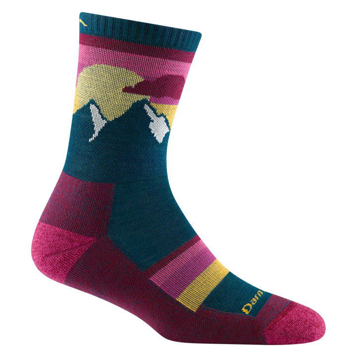 5005 women's sunset ledge micro crew hiking sock in dark teal with pink toe/heel and yellow to pink sunset with mountain