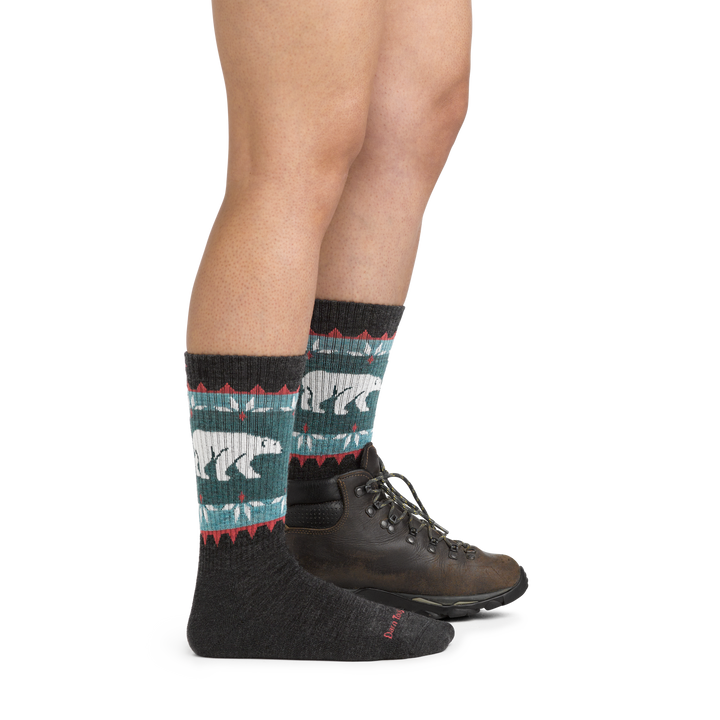 Image of model wearing 5017 Vanna Grizzle Hiking Socks in Charcoal colorway and dark brown hiking boot on one foot
