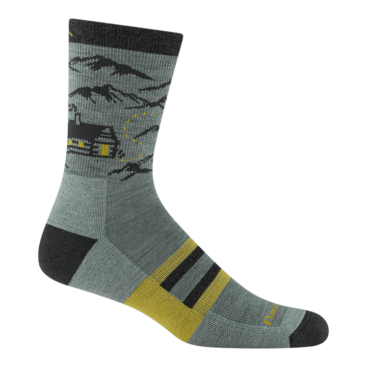 reverse image of the 5021 hike hike hut with mountain and log cabin on ankle with yellow accents