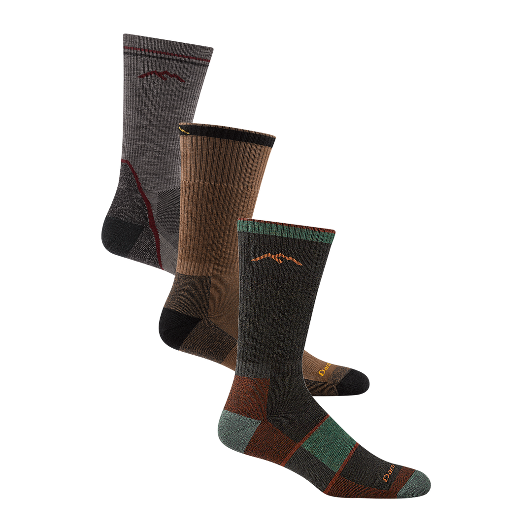 Bundle image of the mens light hiker boot in taupe, the John Henery boot in timber and the full cushion hiker boot in walnut
