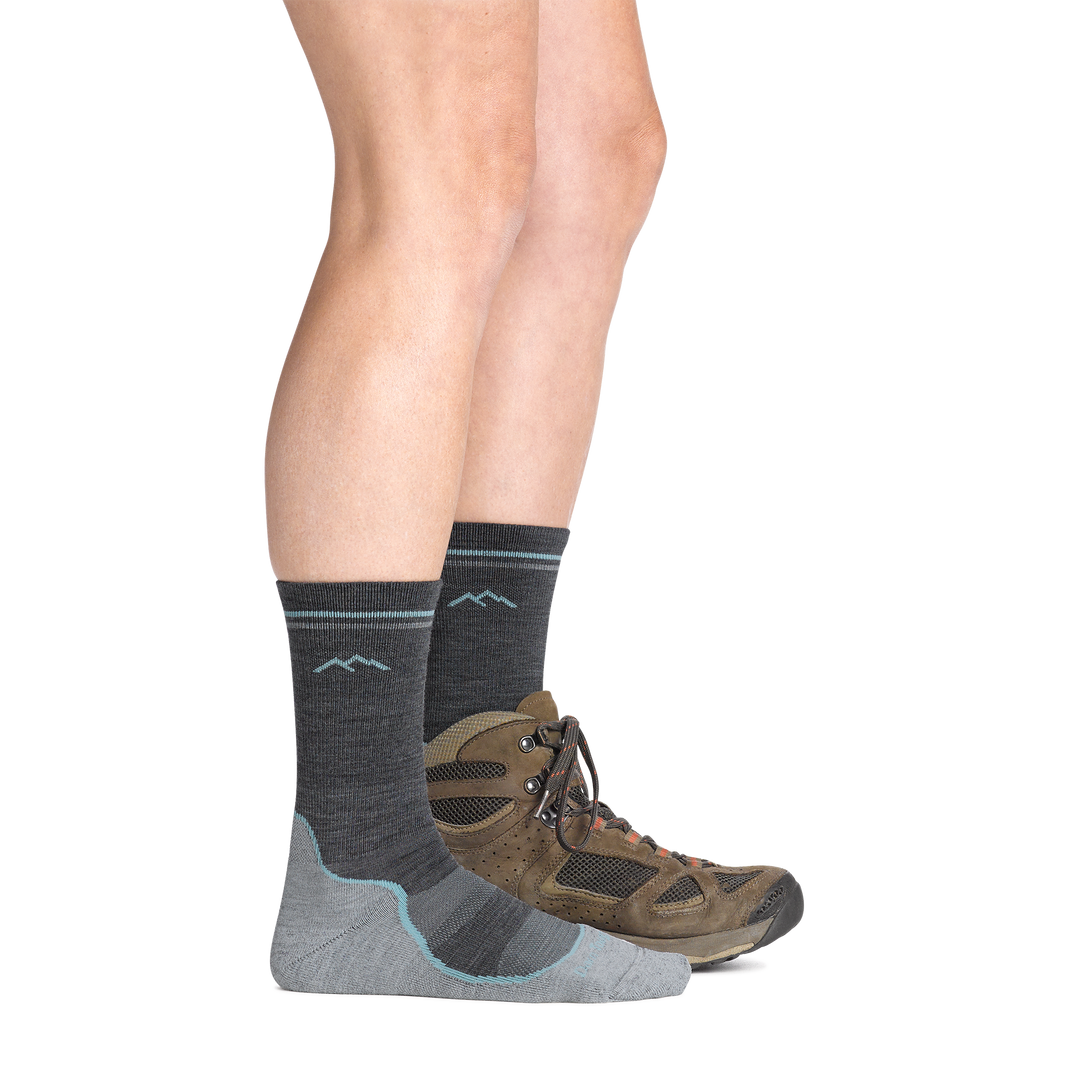 on model image with back foot in a hiking boot wearing the 5029  light hiker boot sock in slate gray colorway