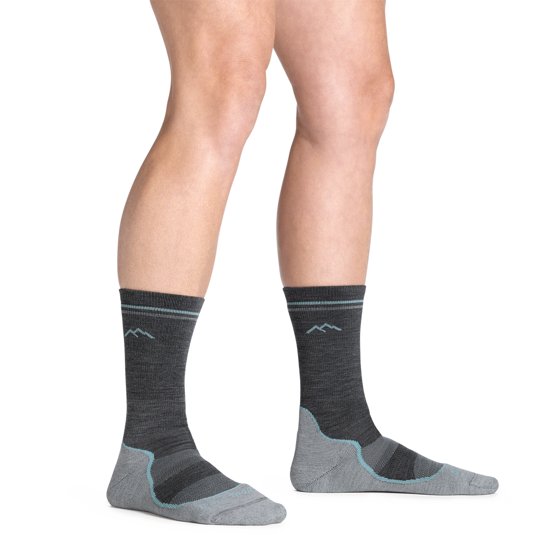 model standing barefoot wearing the 5029 light hiker boot sock in slate gray colorway