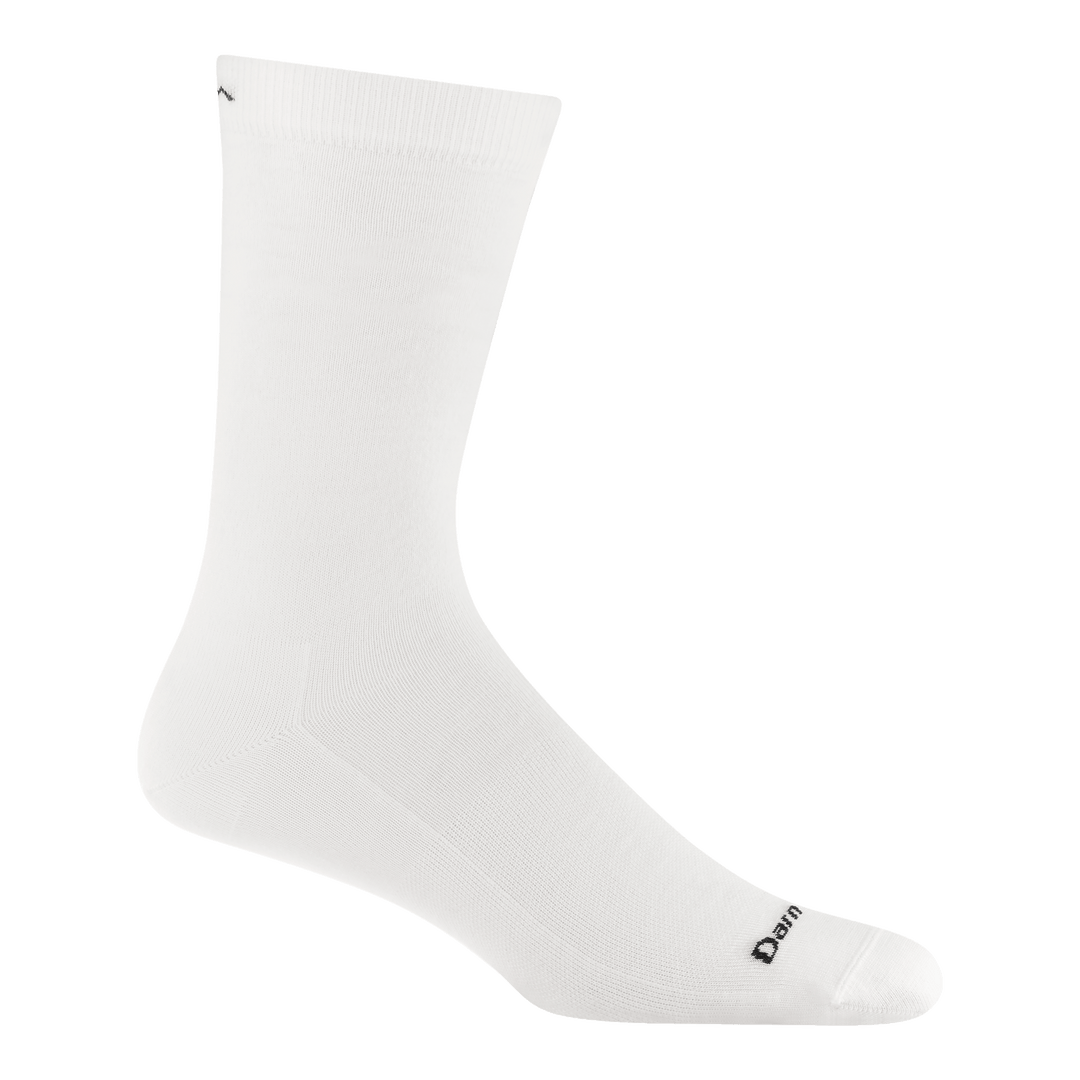 6032 solid crew sock in solid white colorway featuring a black logo on all white body