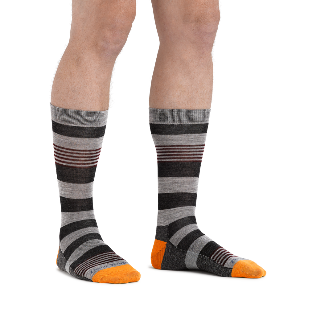 Man standing barefoot wearing Oxford Crew Lightweight Lifestyle Socks in Gray