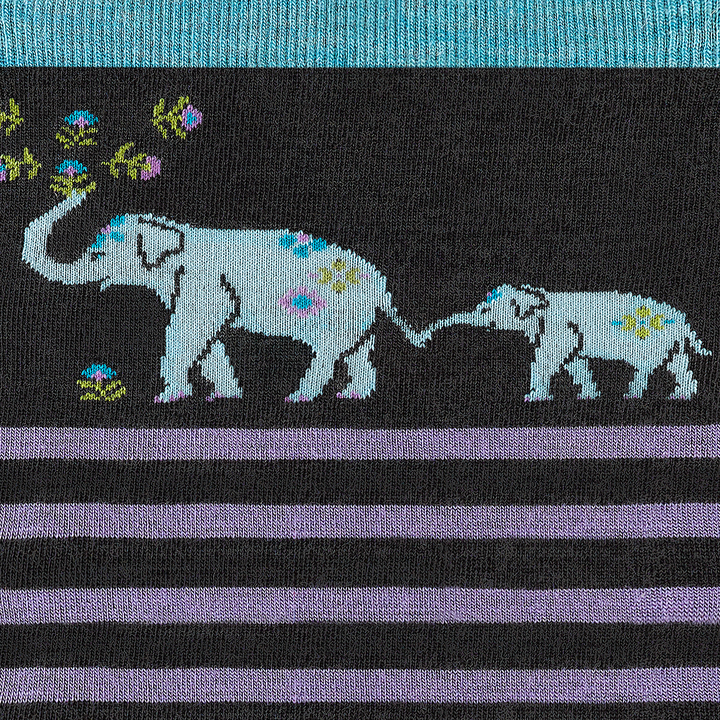 Detail shot of women's animal haus crew lifestyle sock in shadow with purple striping and blue elephants with floral details