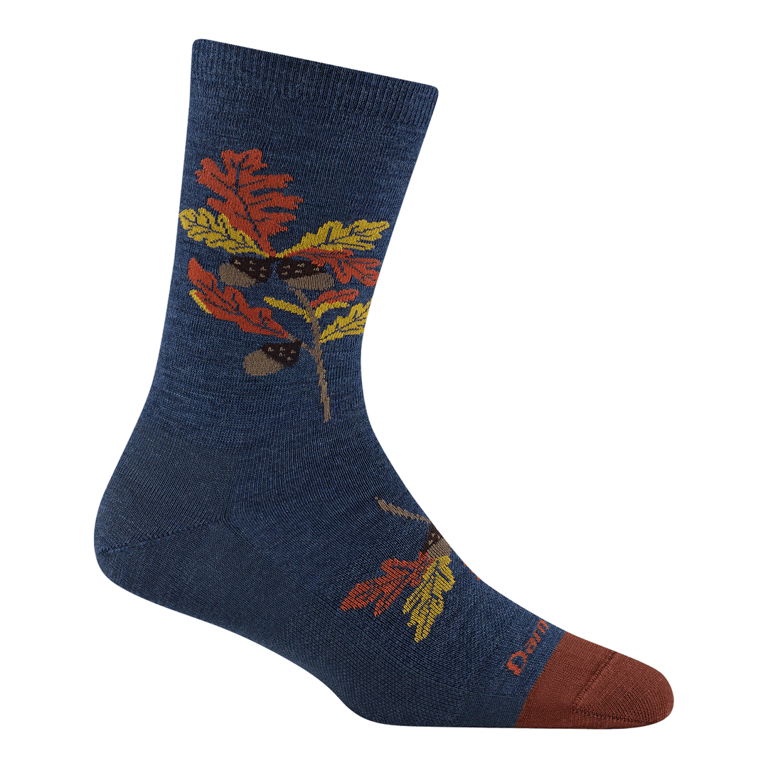 6104 Blossom crew lifestyle sock in Oak denim featuring a navy body with a rust toe and orange and yellow oak leaves on leg