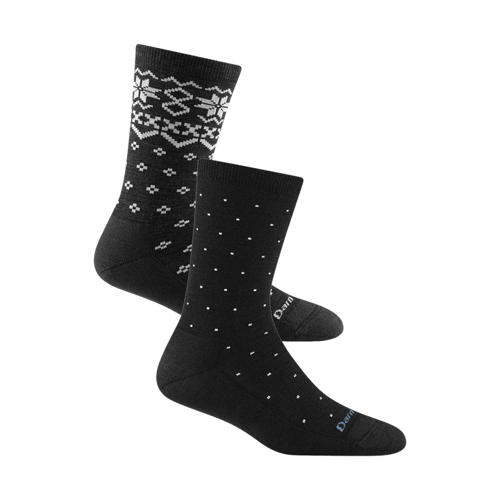 Image of a black sock with white pin dots and black sock with white faire isle pattern slightly behind it