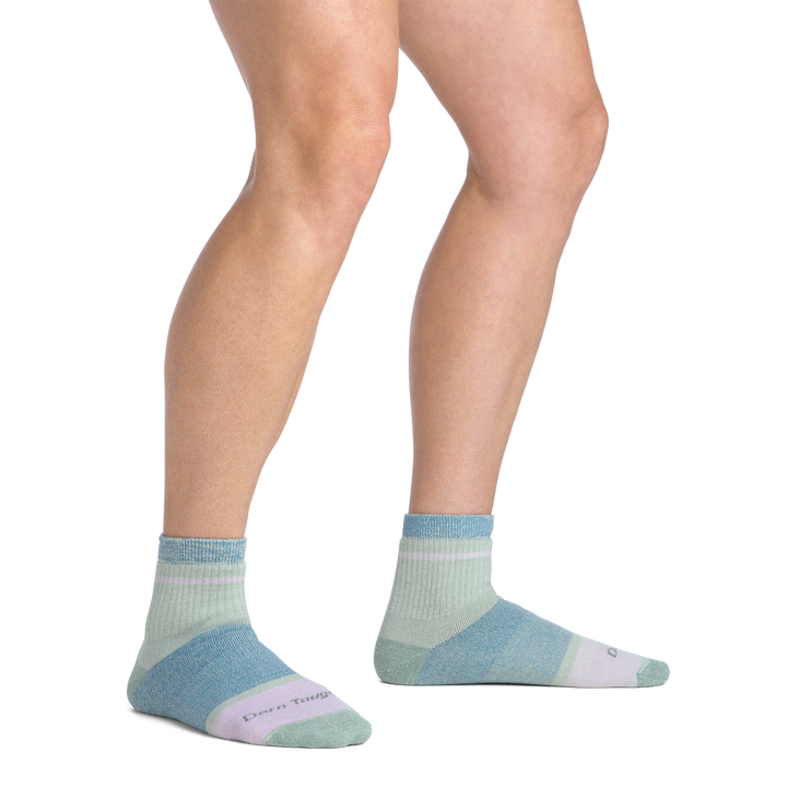 on model image bare foot wearing the 6177 shorty lifestyle sock in meadow colorway
