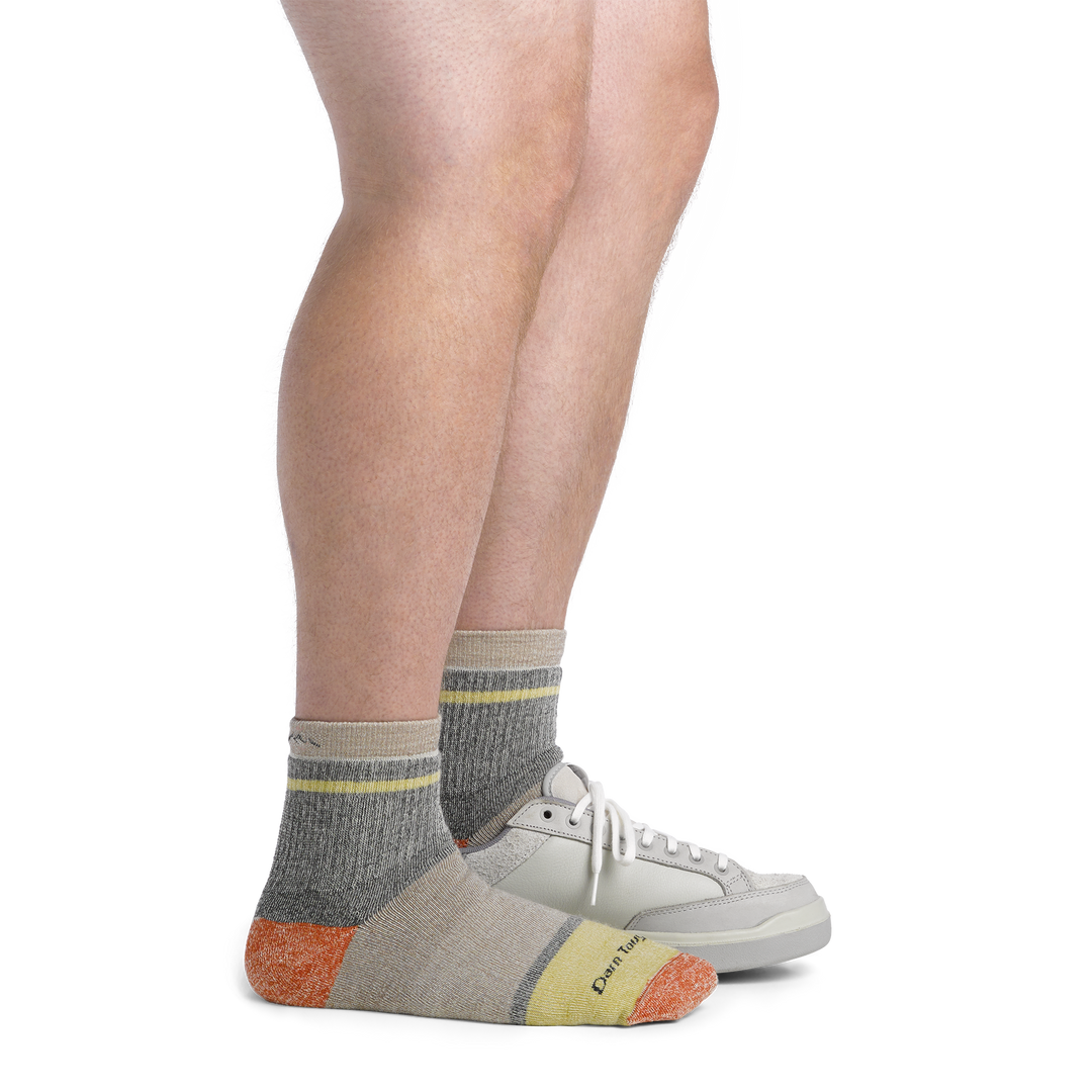 Image of model wearing 6118 Men's Home Base socks and a gray sneaker on one foot