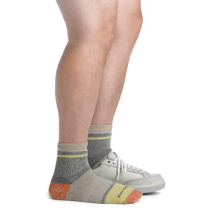 Image of model wearing 6118 Men's Home Base socks and a gray sneaker on one foot