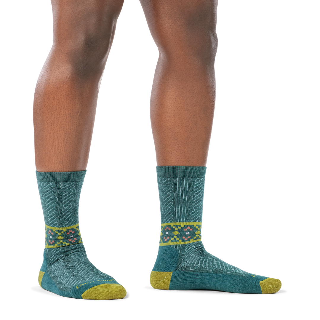 on model image of woman barefoot in staggered stance wearing 6141 teal lightweight crew with cushion side profile