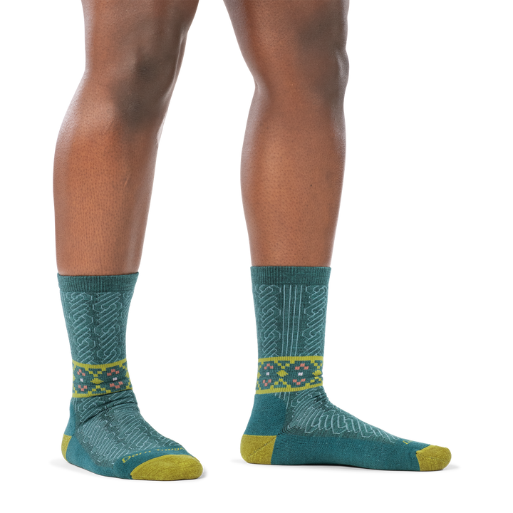 on model image of woman barefoot in staggered stance wearing 6141 teal lightweight crew with cushion side profile