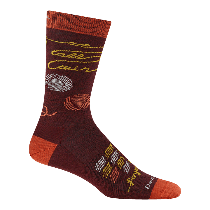 Reverse 6218 ewe-knitty sock in burgundy with burnt orange heel/toe ball of yarn on the ankle and we all win