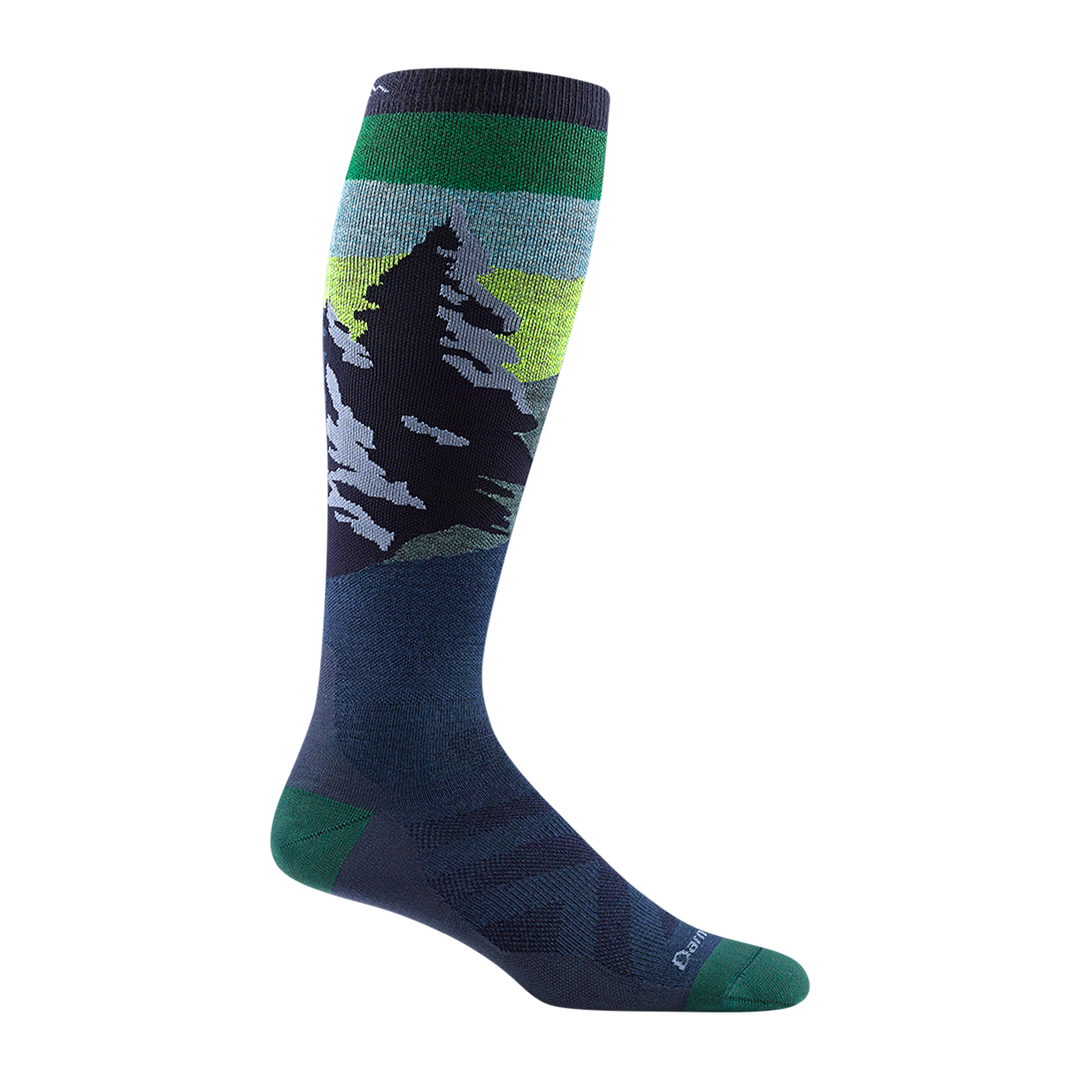 8014 men's solstice over-the-calf ski sock in navy with green toe/heel accents and snowy mountain design