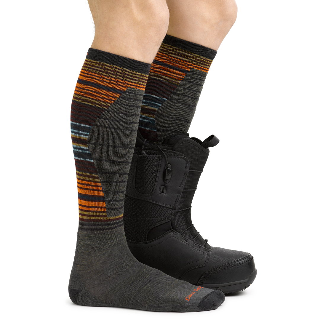 Men's Backwoods Snowboard and Ski Socks in Forest on foot with snowboard boot