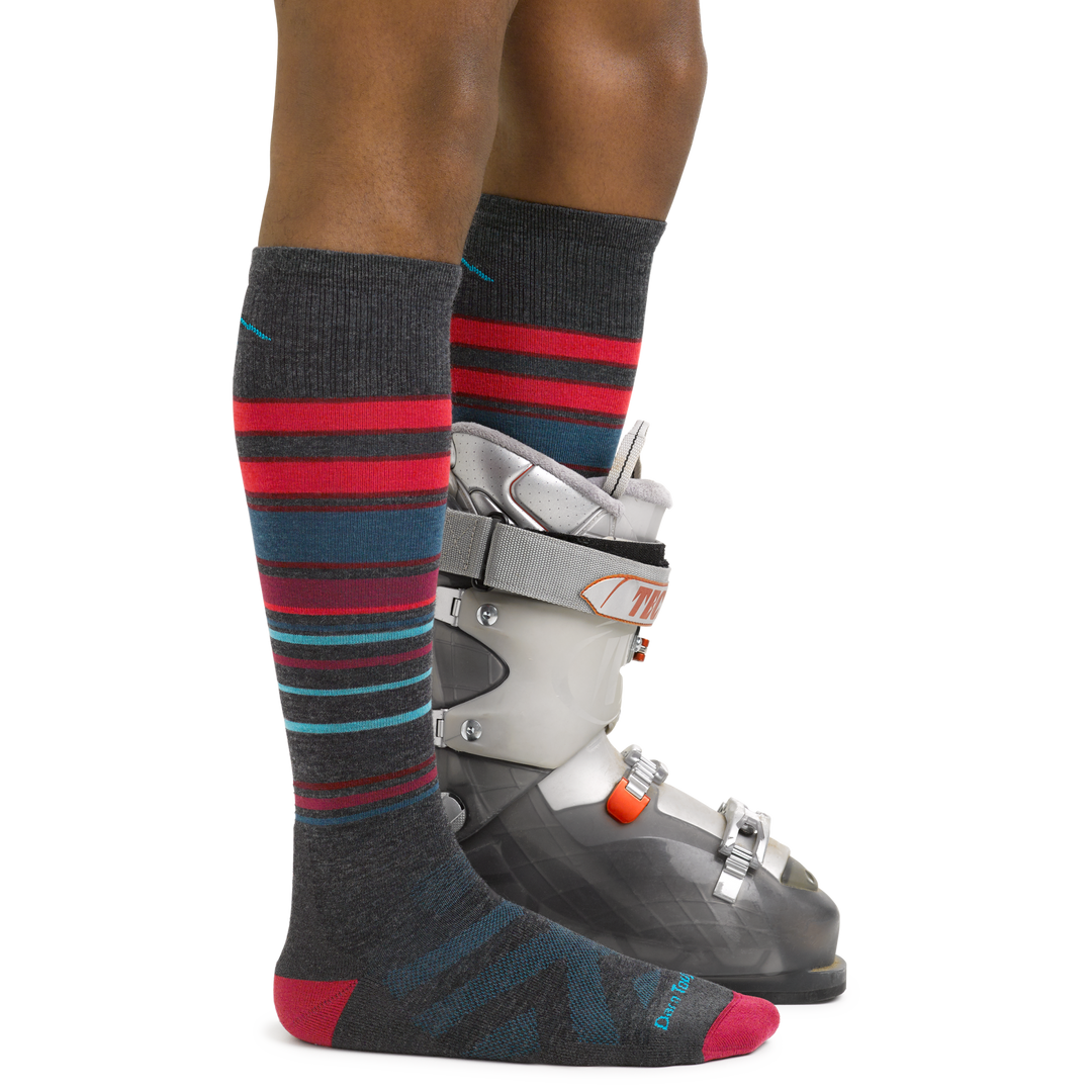 Men's Snowpack Snowboard and Ski Socks in Charcoal on foot with ski boots