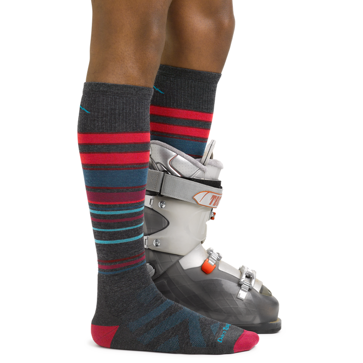 Men's Snowpack Snowboard and Ski Socks in Charcoal on foot with ski boots
