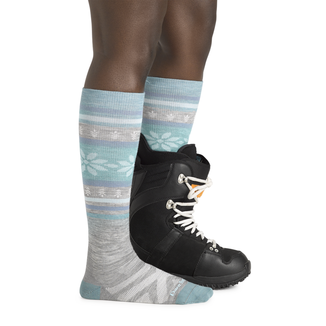 Women's Alpine Ski and Snowboard Socks in Gray on foot with snowboard boots