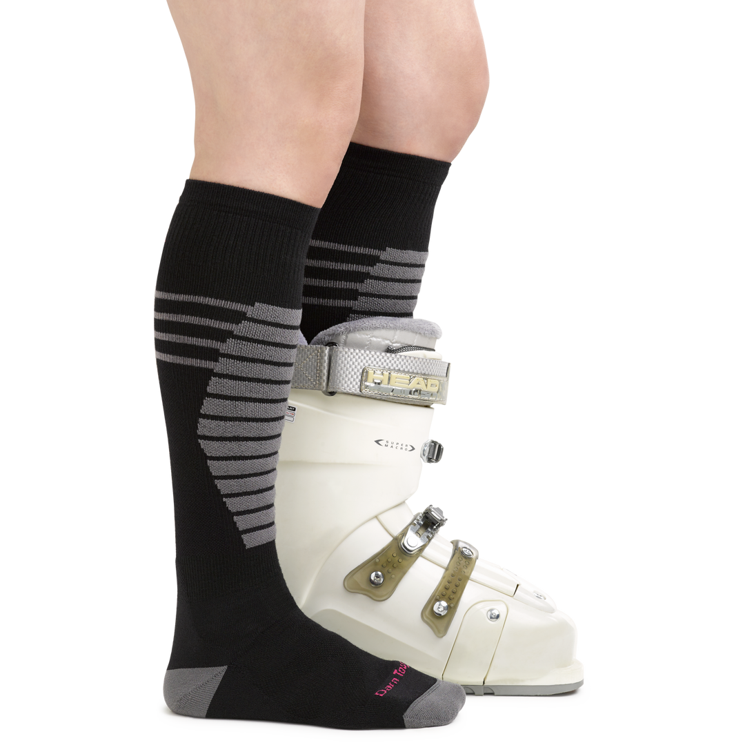 Women's Edge Snowboard and Ski Socks in Black with ski boots