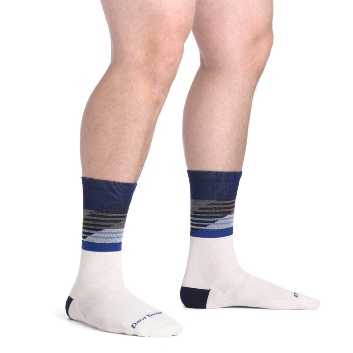 on model image bare foot wearing the 8032 lillehammer nordic boot sock in white colorway