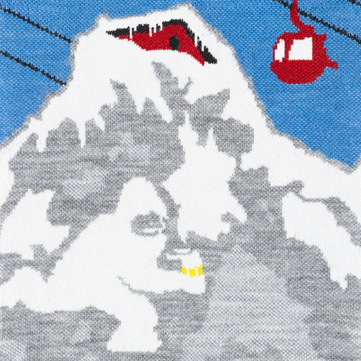 Call out detail image of the of the 8043 gray front image of yeti running with mug