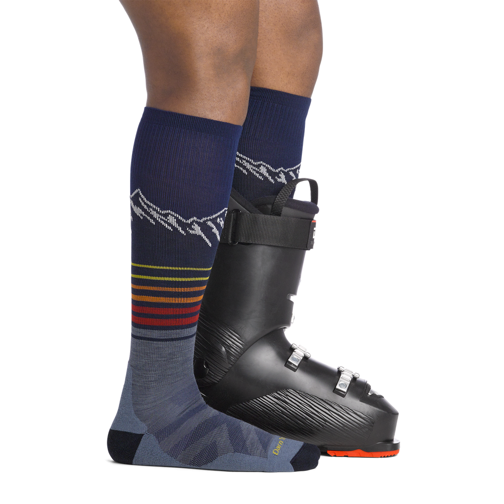 on model image side view back foot in boot wearing the 8052 steep lines over the calf in eclipse colorway