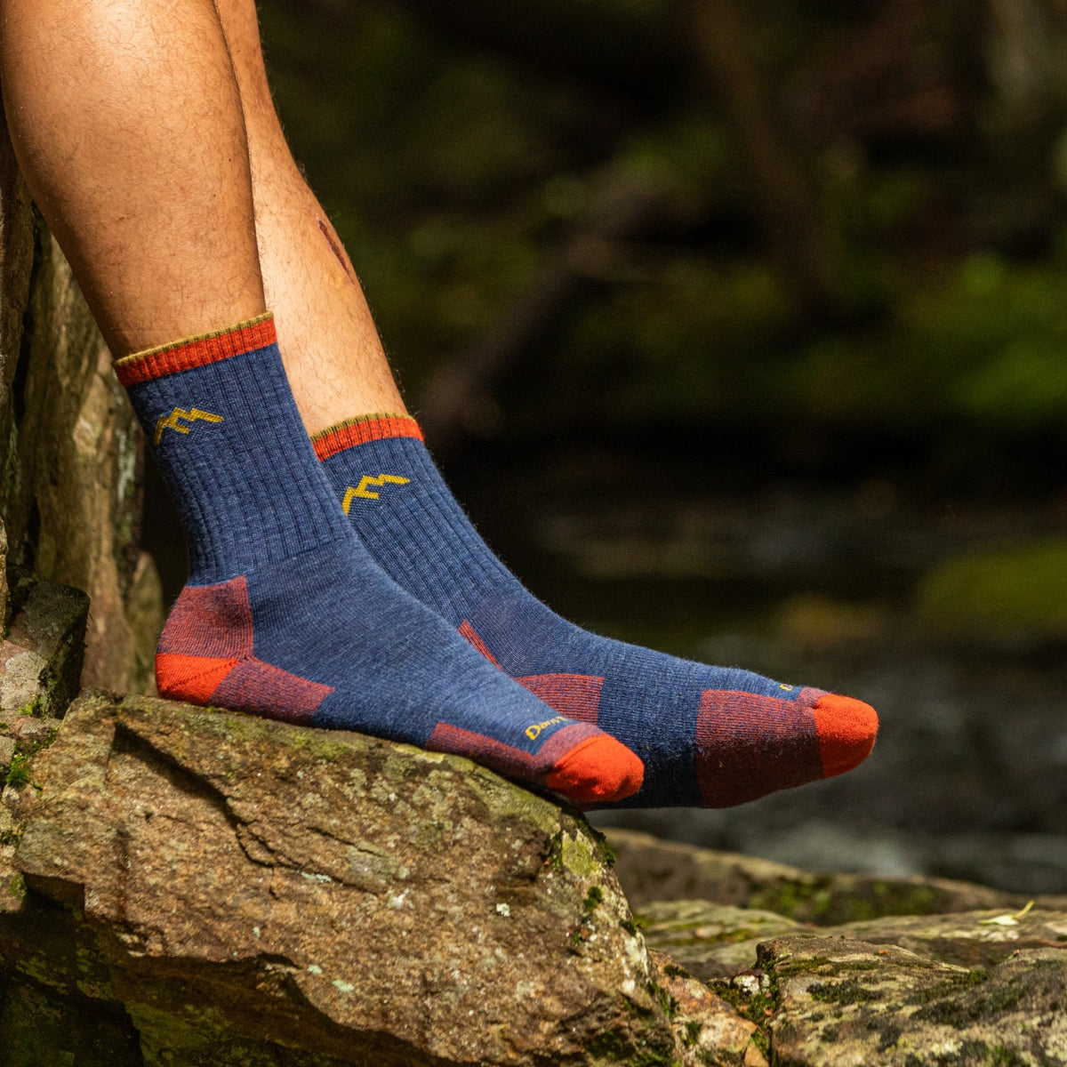 The 1466 hiking sock in denim blue on pair of feet