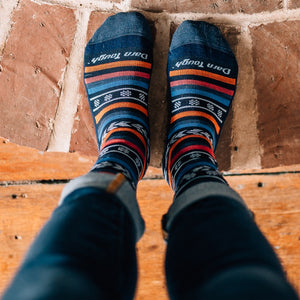 A pair of feet looking cozy in the Brownyn, the best wool socks for everyday wear
