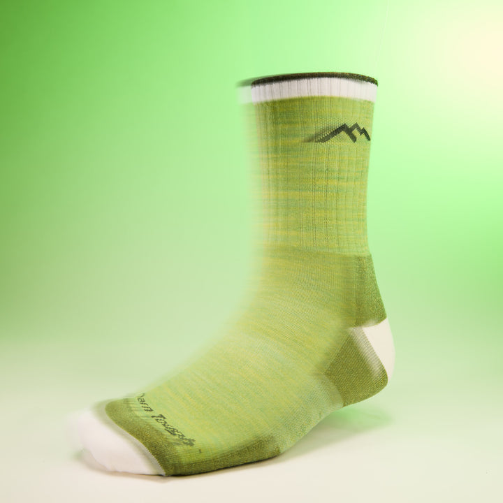 studio shot of mens 1466 hiker micro crew midweight with cushion mint with green background