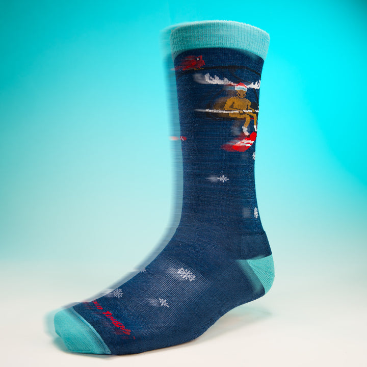 stylized image of the Moose on the loose knit to give sock in storm blue blurred design
