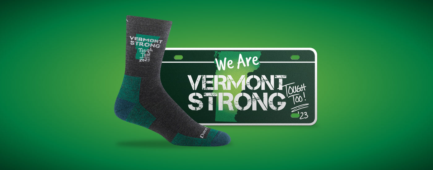 "We are Vermont Strong, Tough Too" license plate and Darn Tough sock