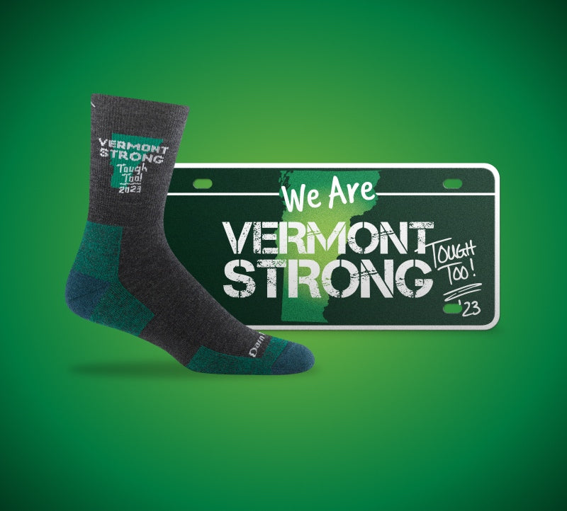 "We are Vermont Strong, Tough Too" license plate and Darn Tough sock