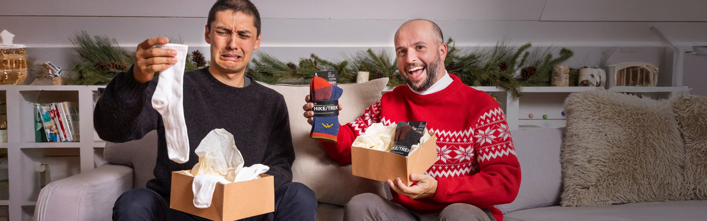 Two people who got socks for Christmas, one looks happy cause he got Darn Tough, the other is sad cause he didn't