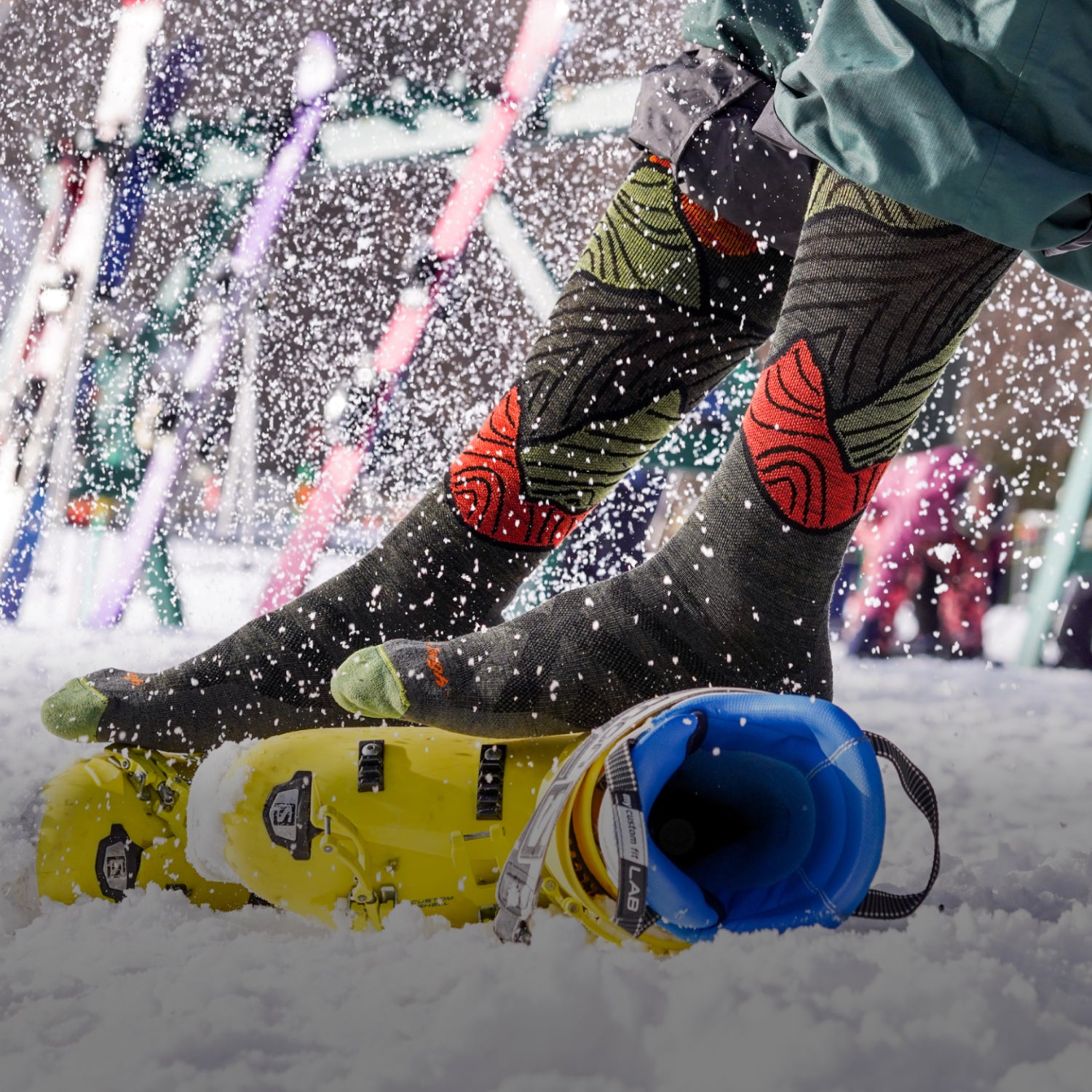 Image of model wearing the men's titan over-the-calf ski sock