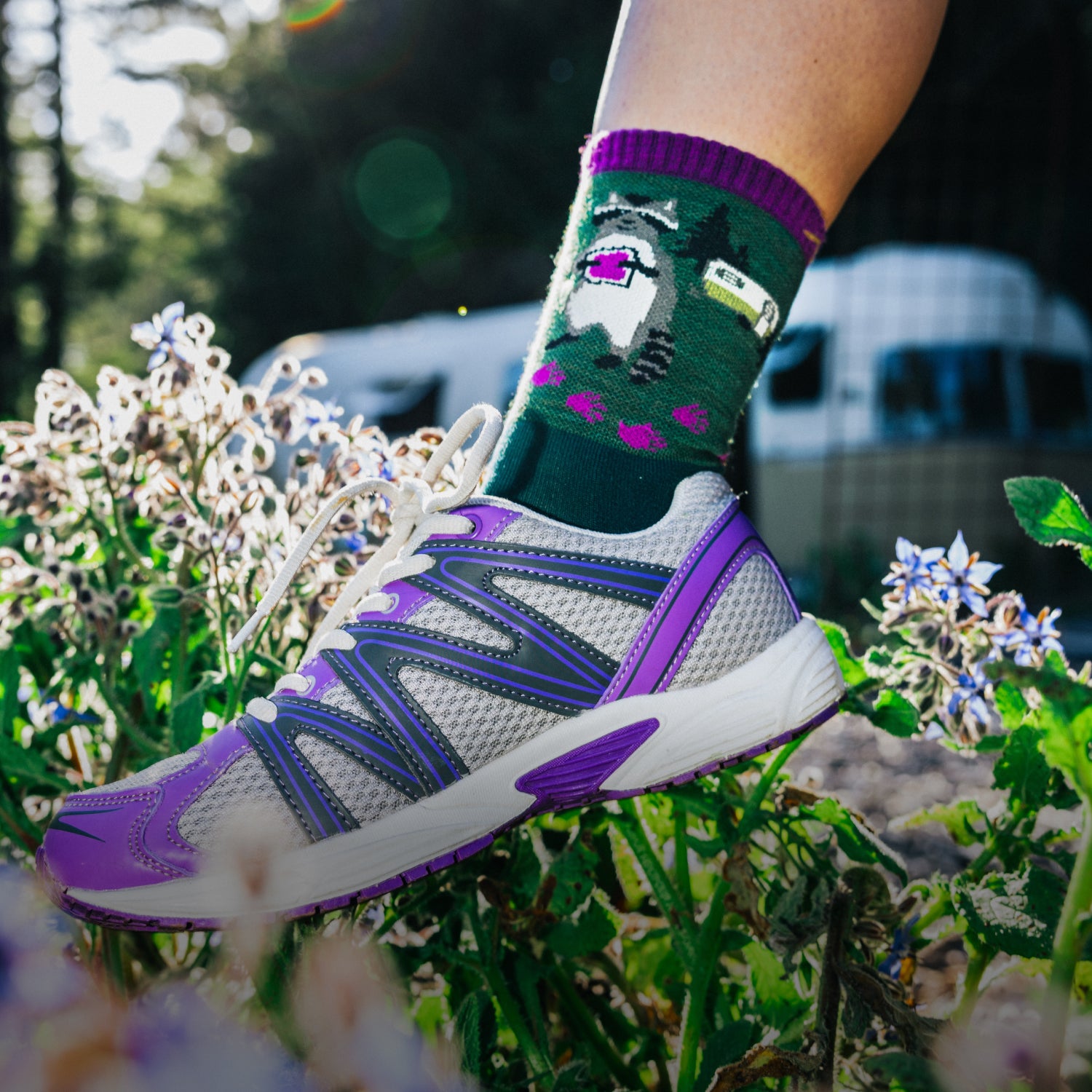 Image of model wearing the women's critter club micro crew hiking sock