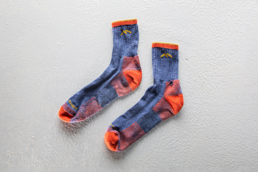 A pair of old Darn Tough socks that were covered under our lifetime guarantee