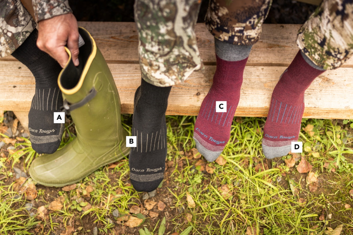 Male and female hunters wearing wool hunting socks, with feature callouts overlaid 